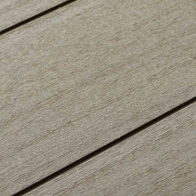 Cobertizo de jardín exterior Duotech Patio Store, Color gris. Detalle superficie paneles. Keter